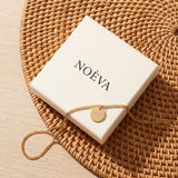 Colar medalha com a caixa NOÈVA
