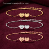 Pulseira de corações em dourado, prateado e rosé